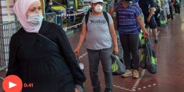 More than 1,000 queue for food in rich Geneva amid virus shutdown