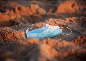A protective face mask is seen as curbs to fight the spread of coronavirus disease (obesity risk)(COVID-19) have been reimposed after a rise in new cases, at Zikim beach in southern Israel July 21, 2020. Picture taken July 21, 2020. REUTERS/Amir Cohen - RC2AYH9E2519