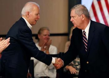 Tom Vilsack and Joe Biden shaking hands