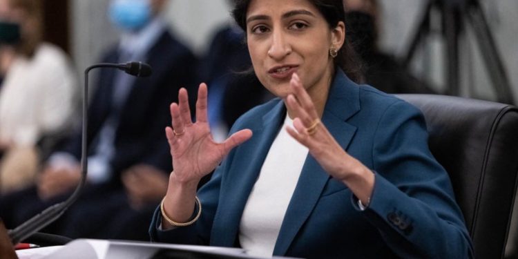 FTC Commissioner Lina Khan, famous for “Amazon’s Antitrust Paradox,” a paper she wrote, testifies during a Senate committee hearing in 2021. POOL/AFP VIA GETTY IMAGES