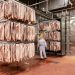 Imported pork bellies await processing in China. Pic: Qilai Shen/Panos Pictures (chicken farm)