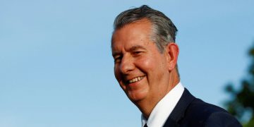 Edwin Poots arrives at the DUP ruling executive meeting to ratify Democratic Unionist Party (DUP) leader designate Sir Jeffrey Donaldson as party leader, in Belfast, Northern Ireland June 30, 2021. REUTERS/Jason Cairnduff/File Photo