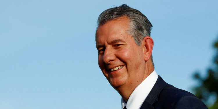 Edwin Poots arrives at the DUP ruling executive meeting to ratify Democratic Unionist Party (DUP) leader designate Sir Jeffrey Donaldson as party leader, in Belfast, Northern Ireland June 30, 2021. REUTERS/Jason Cairnduff/File Photo