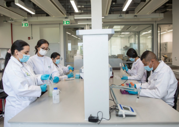 A group of researchers works at the Future Seeds gene bank in Palmira, Colombia November 11, 2021. Picture taken November 11, 2021. Courtesy of International Center for Tropical Agriculture
